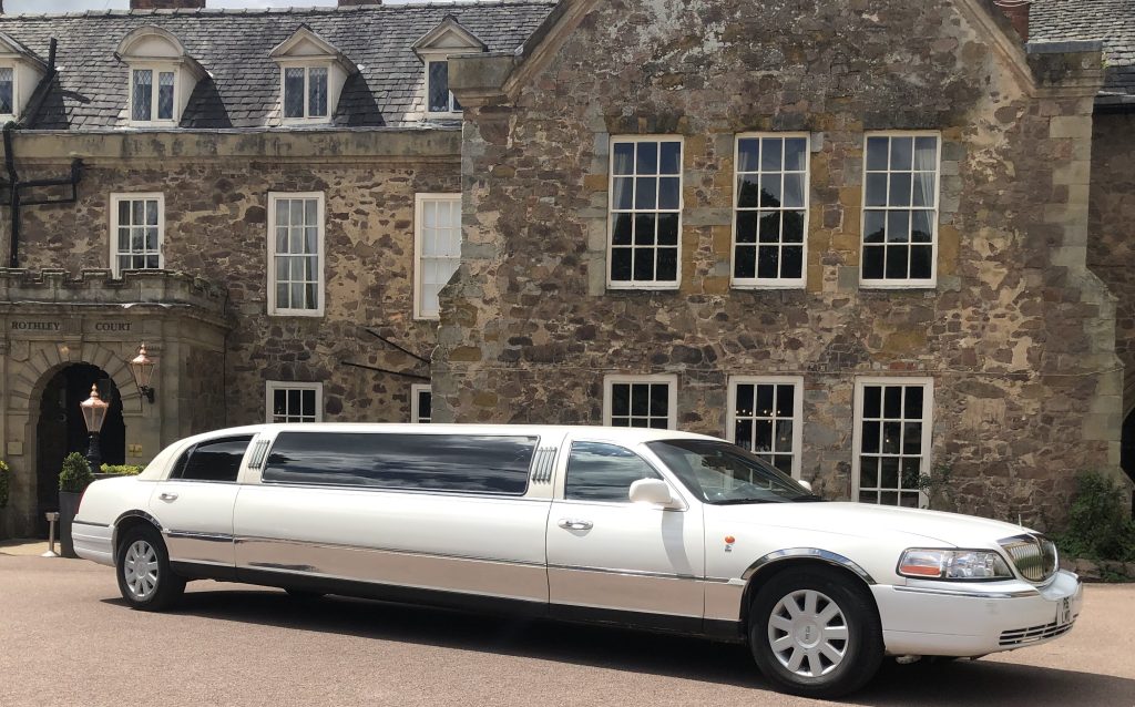 Tamworth Lincoln Town car beside park